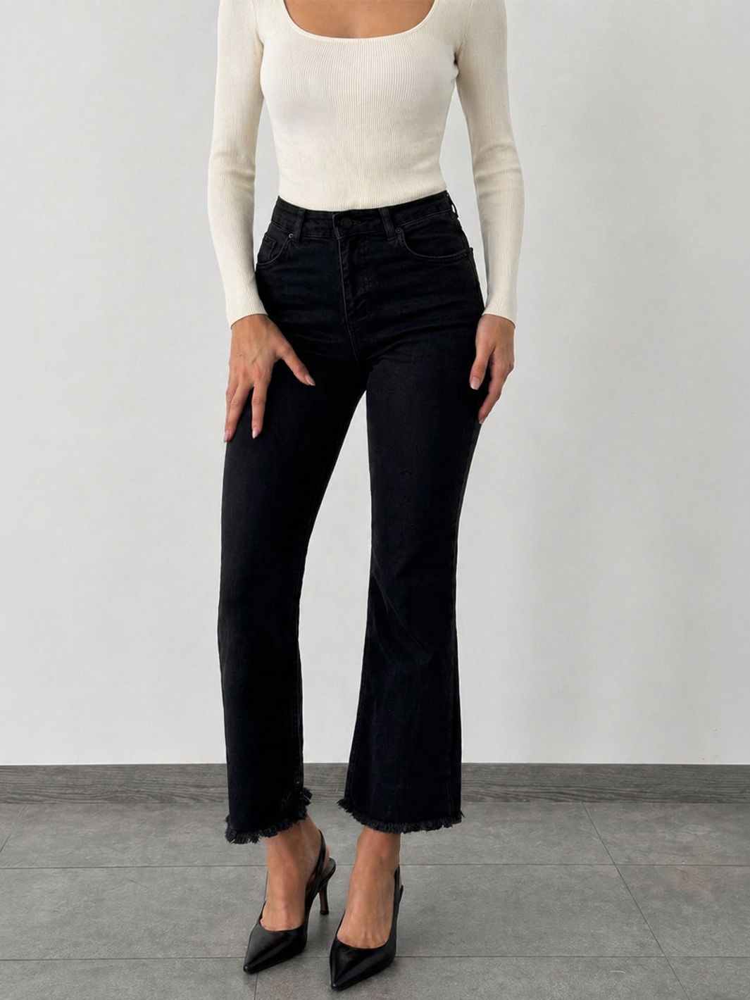Mila Mini Flare Jean in Black – full length front view styled outfit