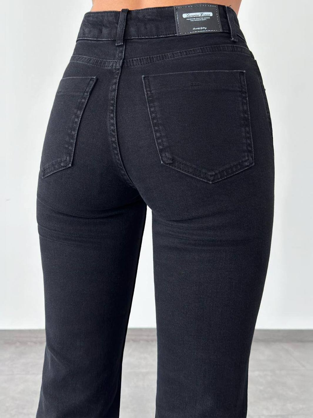 Mila Mini Flare Jean Black – close up back view showing pocket detailing and stitching