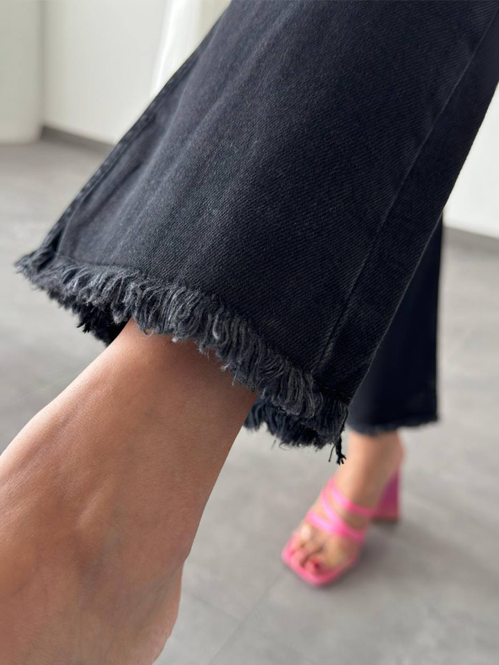 Mila Mini Flare Jean Black – close up of cropped frayed hem detail