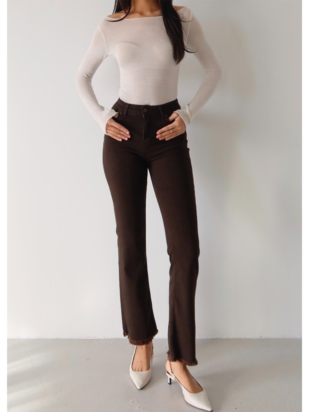 Mila Mini Flare Jean in Espresso – full body front view styled with hands in pockets