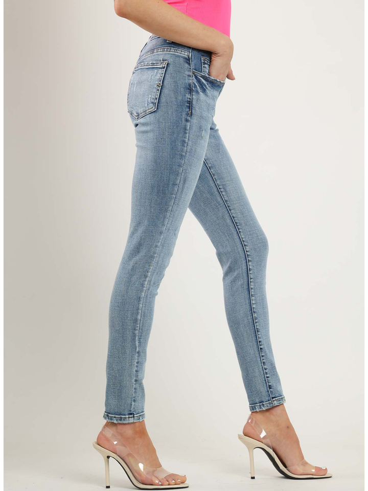 Orito Medium Blue Skinny Jean — side profile with movement | Bianco Jeans