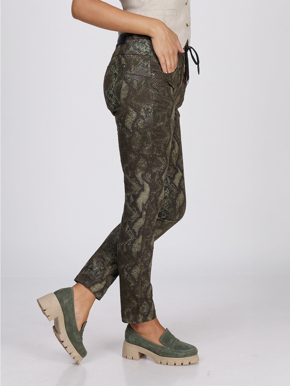 Peyton Olive Pant - Half Body Side Profile with Movement | Bianco Jeans
