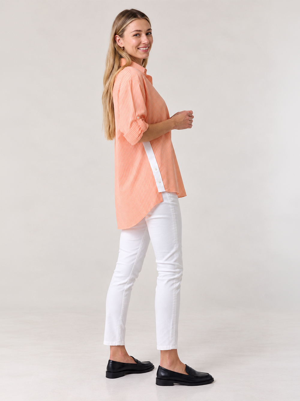 Sienna Stripe Shirt – Apricot — full body side pose image showing shirt side panel detail | Bianco Jeans