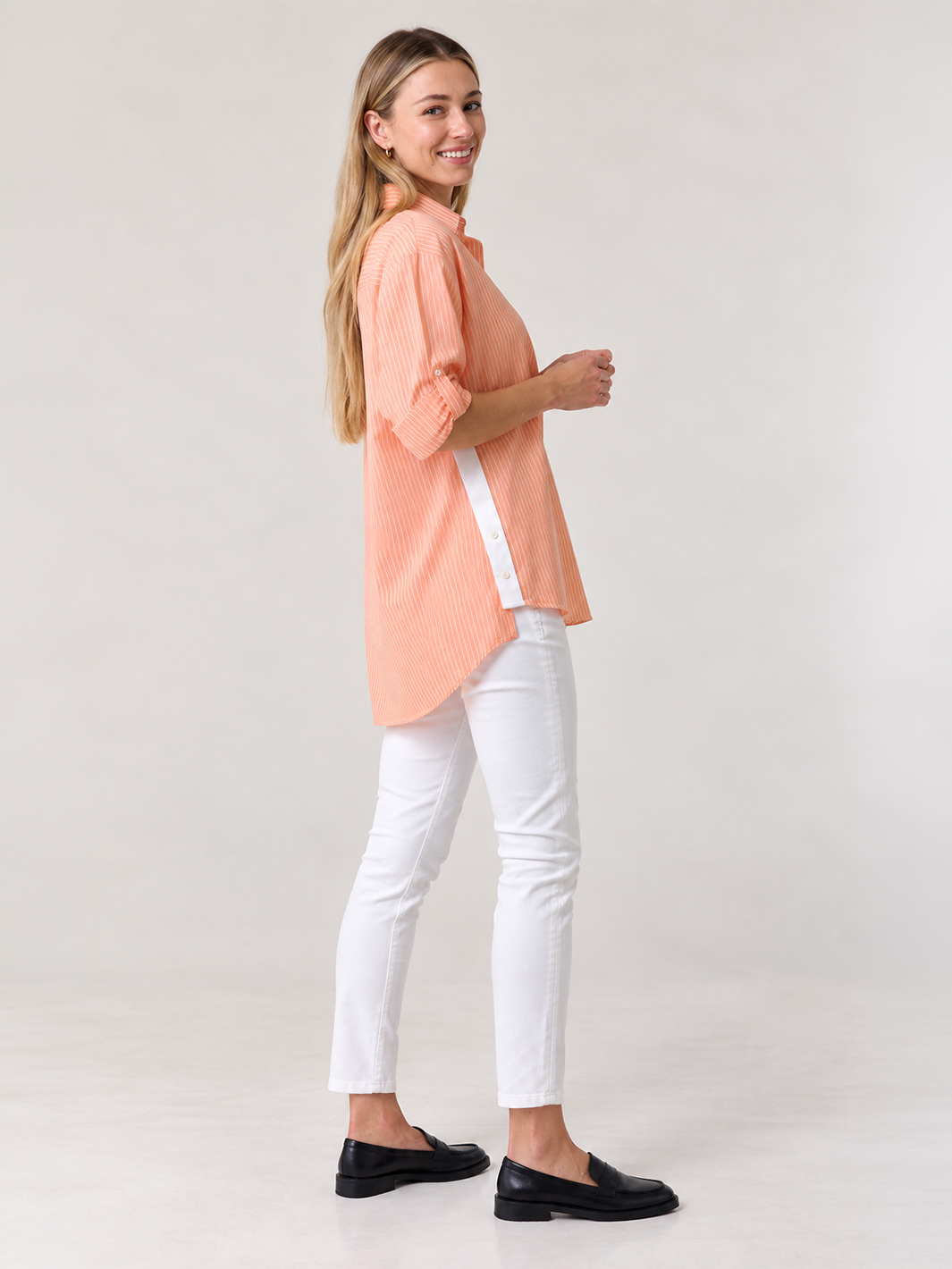 Sienna Stripe Shirt – Apricot — full body side pose image showing shirt side panel detail | Bianco Jeans