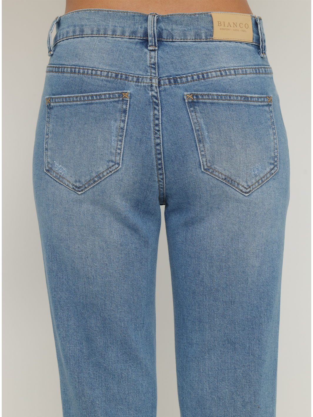 Isabella Straight Jean Medium Blue — close up of back pocket with light distress detailing on medium blue denim | Bianco Jeans