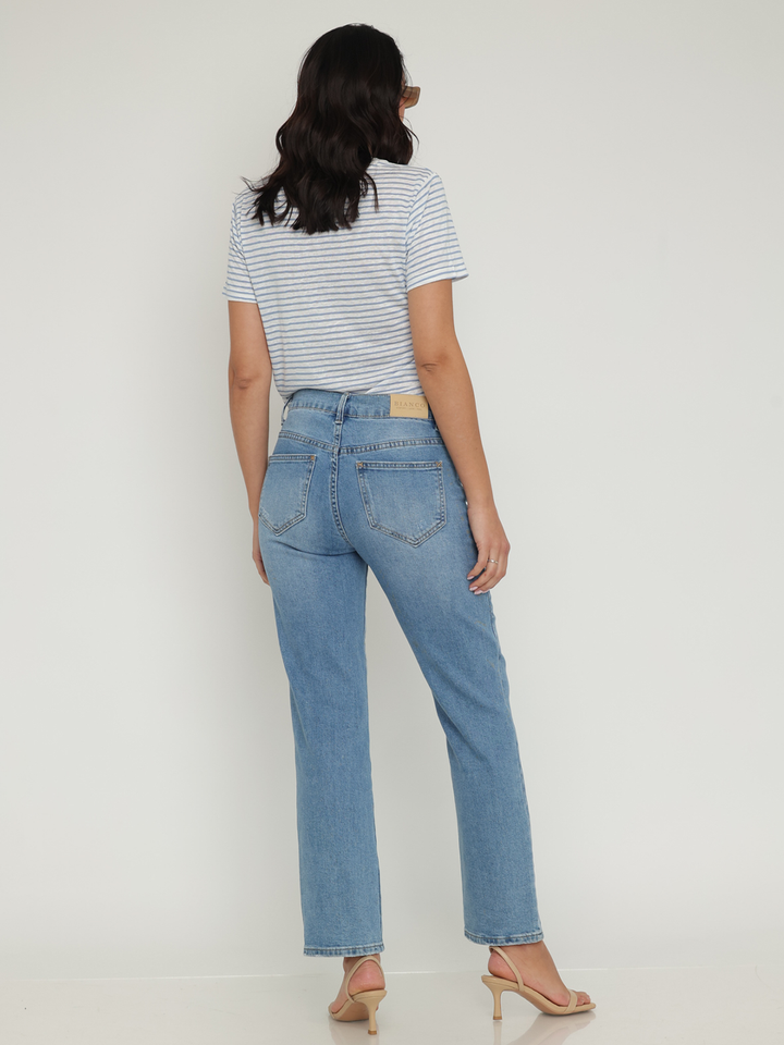 Isabella Straight Jean Medium Blue — full body back facing view in motion, flattering straight leg medium blue denim | Bianco Jeans