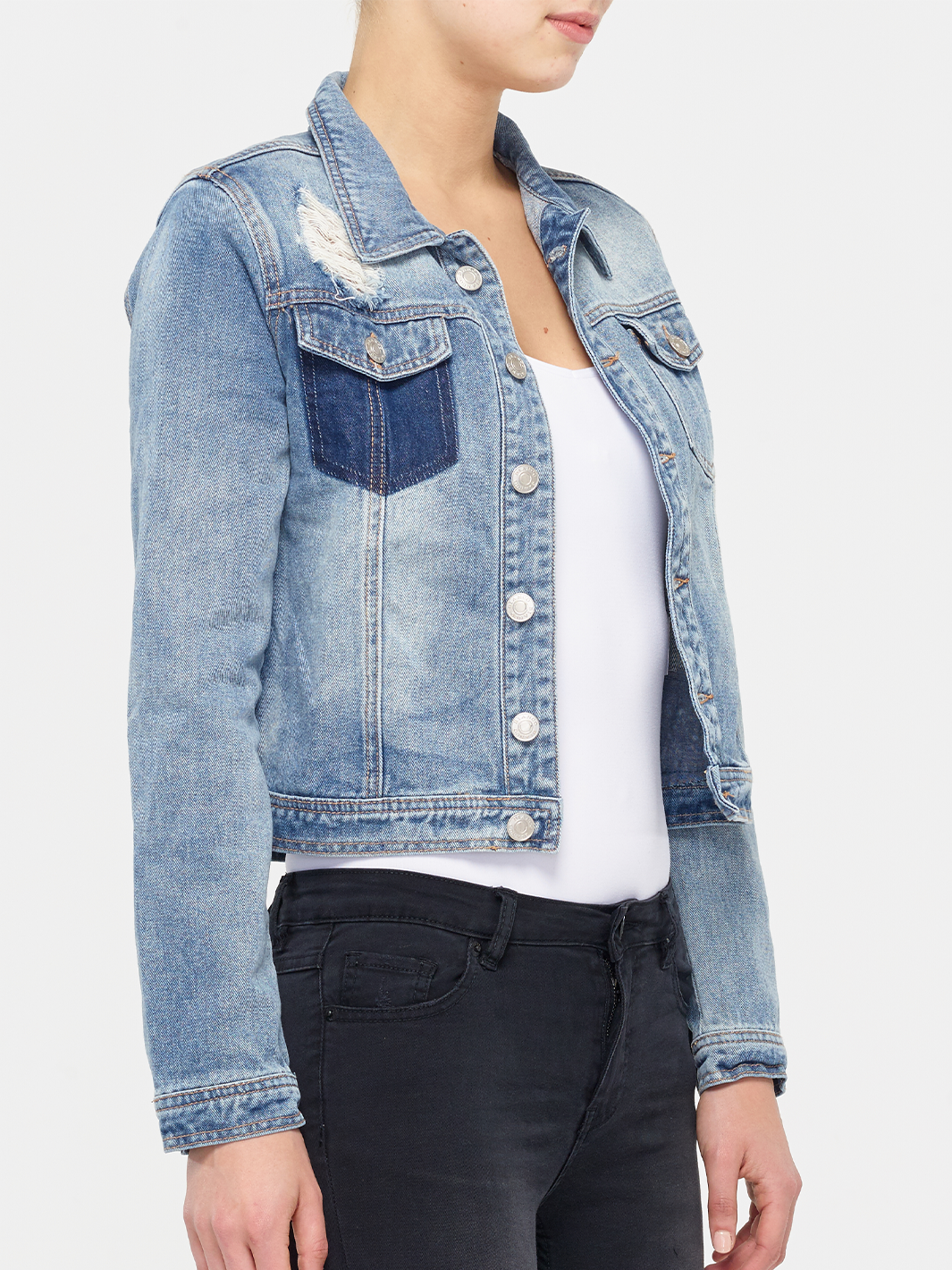 Riley Distressed Denim Jacket — front facing side styled image | Bianco Jeans
